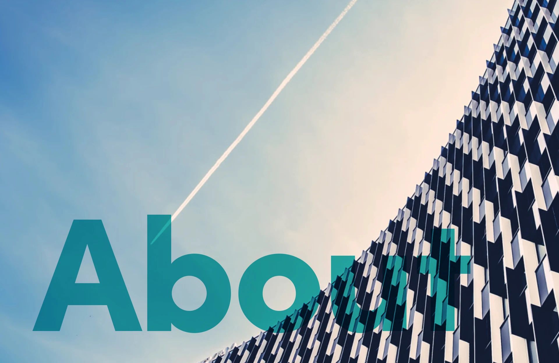 View along a building into the sky. Contrail. "About" lettering as overlay